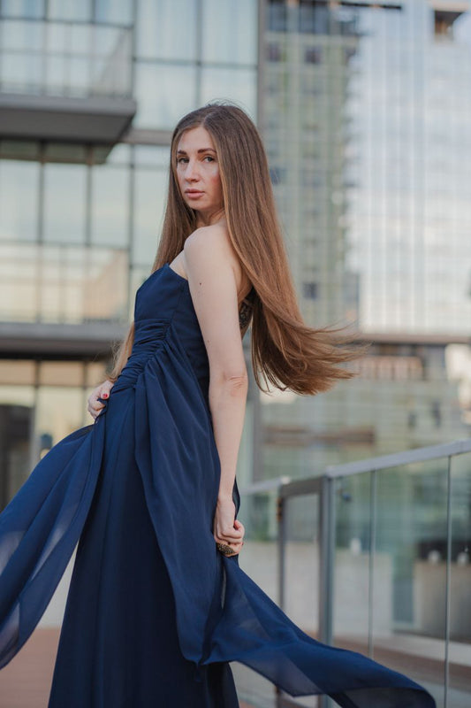 Elegant navy blue long dress on the model Daria